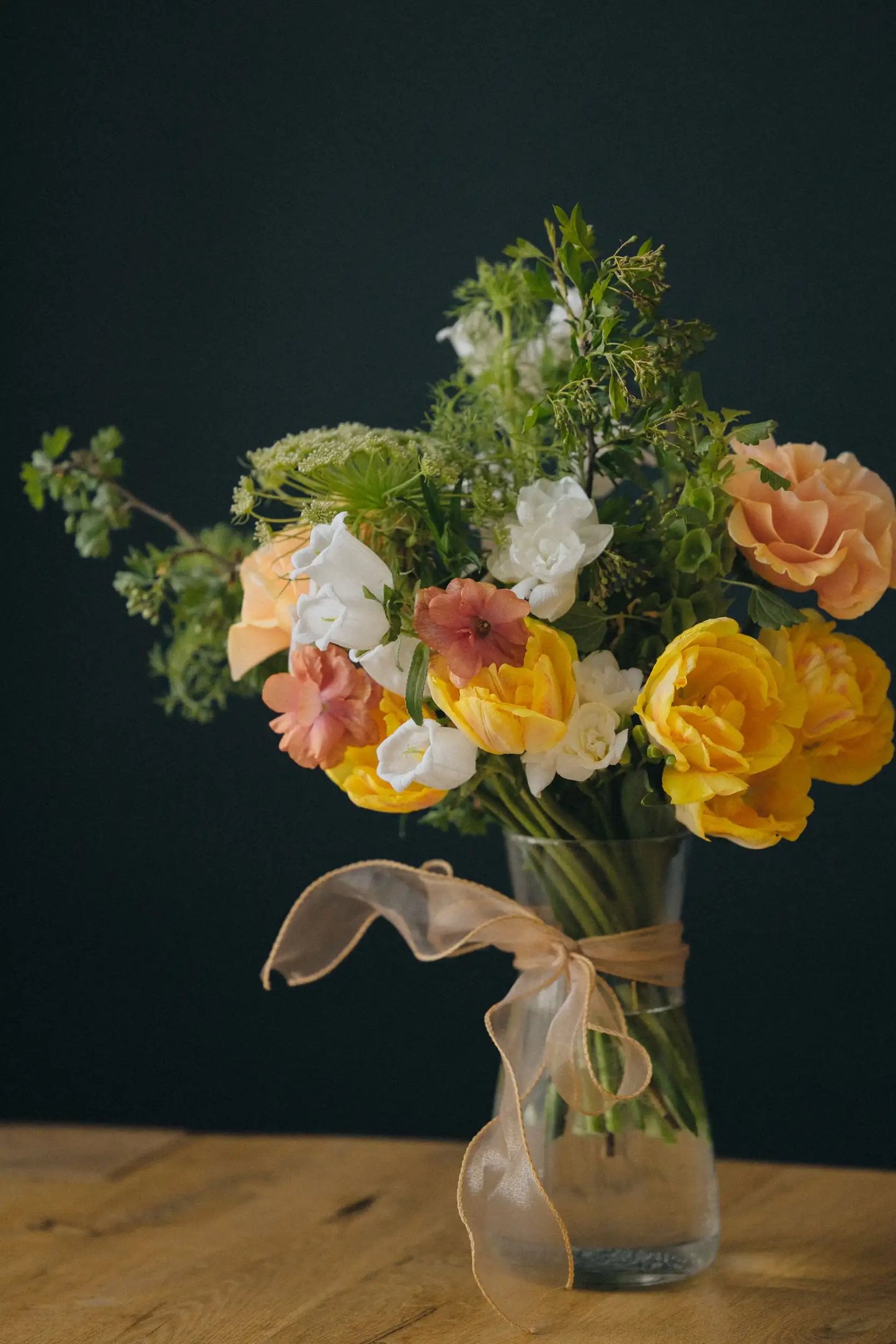Custom designed small flower bouquet in bright palette with seasonal blooms Austin delivery Kvetka Flower