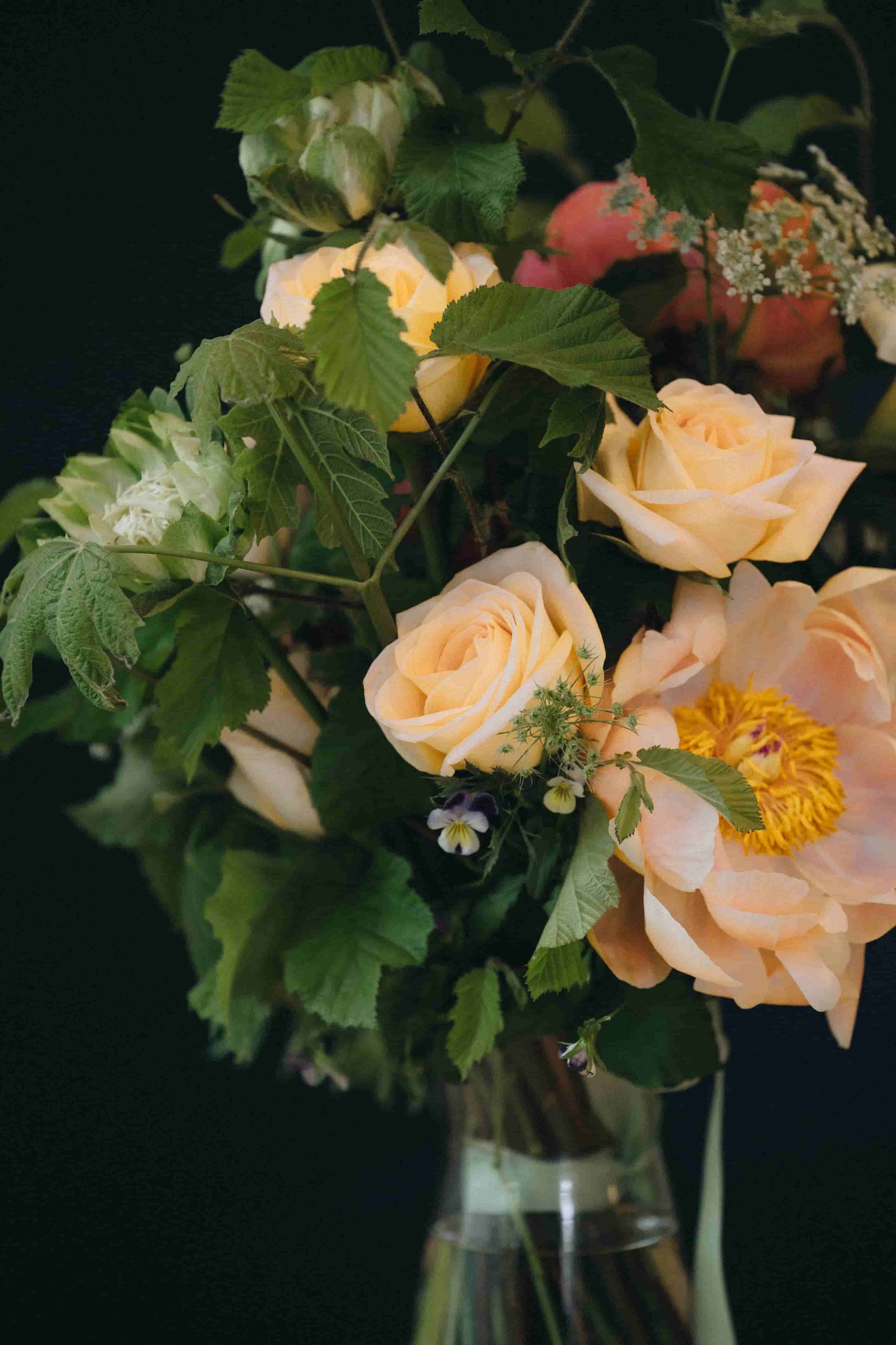 Seasonal roses, peonies, and Queen Anne’s lace in bouquet – Austin florist