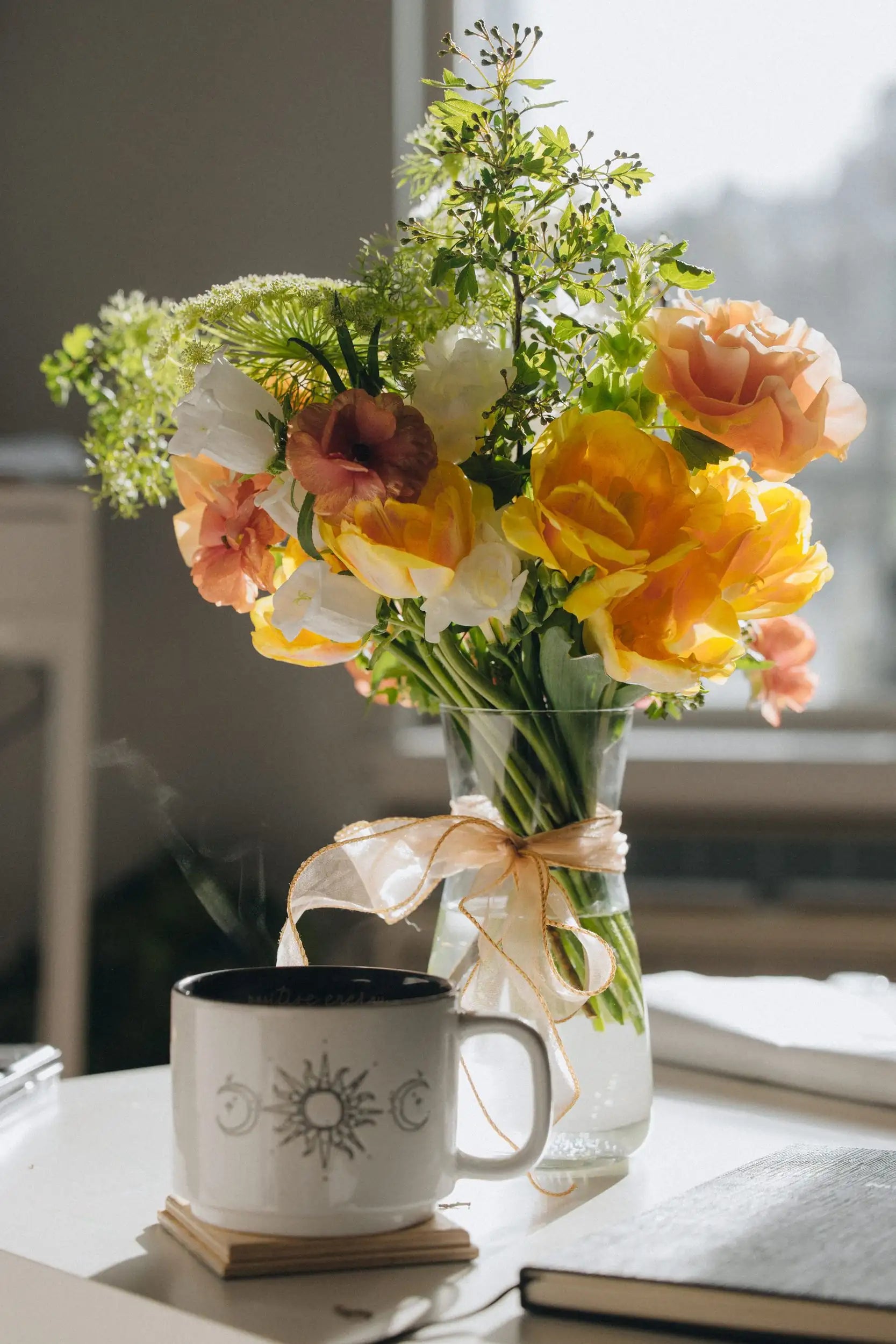 Custom flower bouquet small in glass vase morning light lifestyle Kvetka Flower