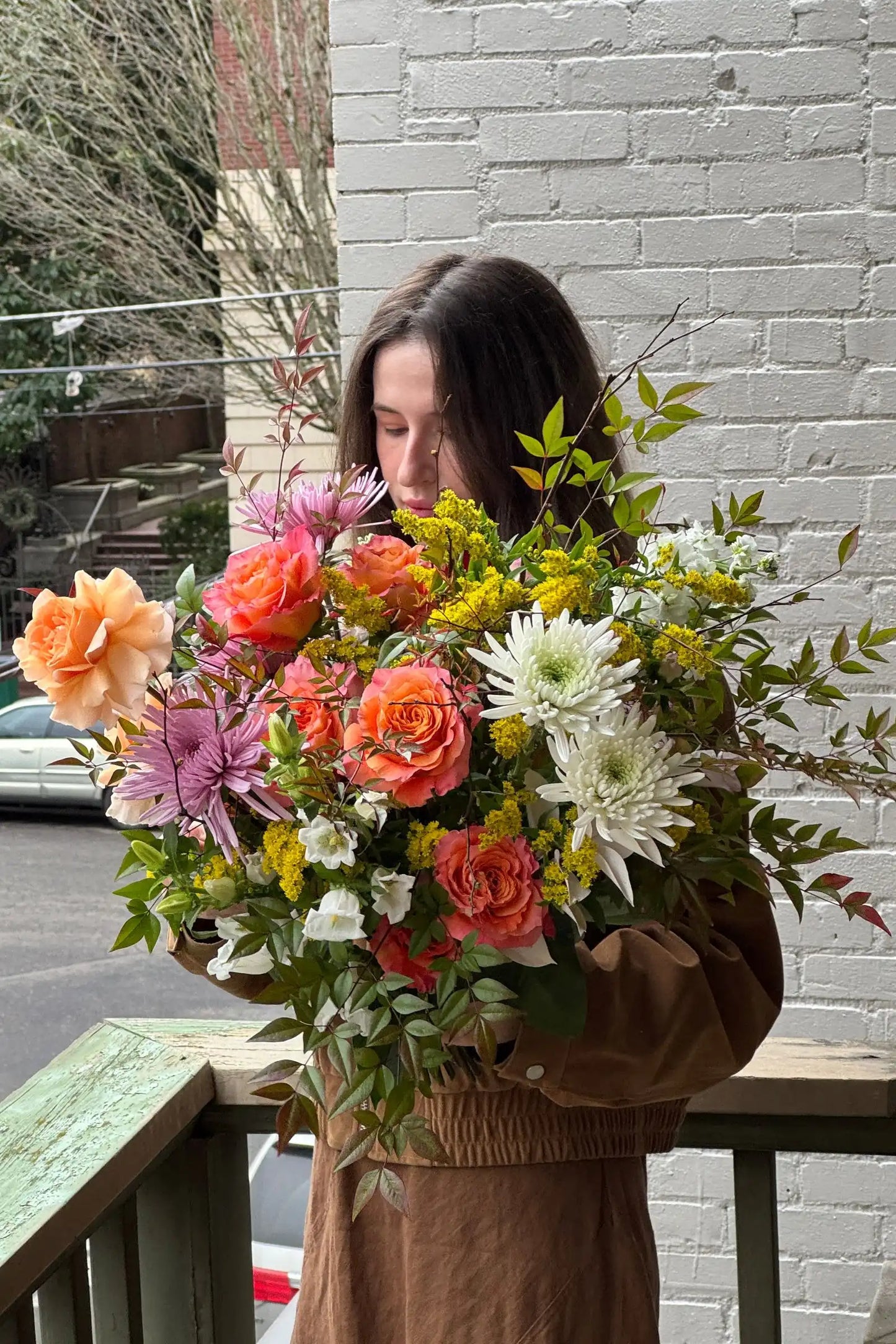Large seasonal bouquet with orange roses and seasonal blooms Kvetka Flower same-day delivery