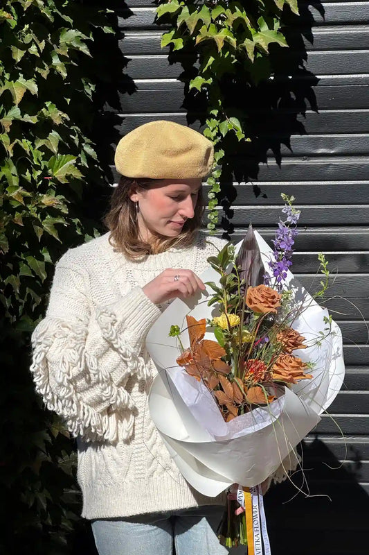 Handcrafted fresh seasonal bouquet small with warm autumn tones, orange roses and purple accents by Kvetka Flower