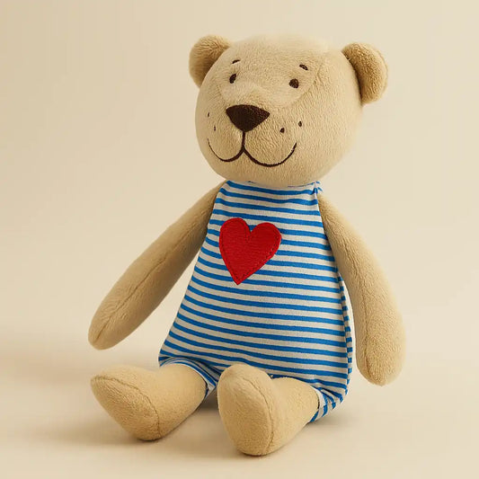 Beige plush teddy bear in blue striped outfit with red heart – Buddy Bear by Kvetka Flower
