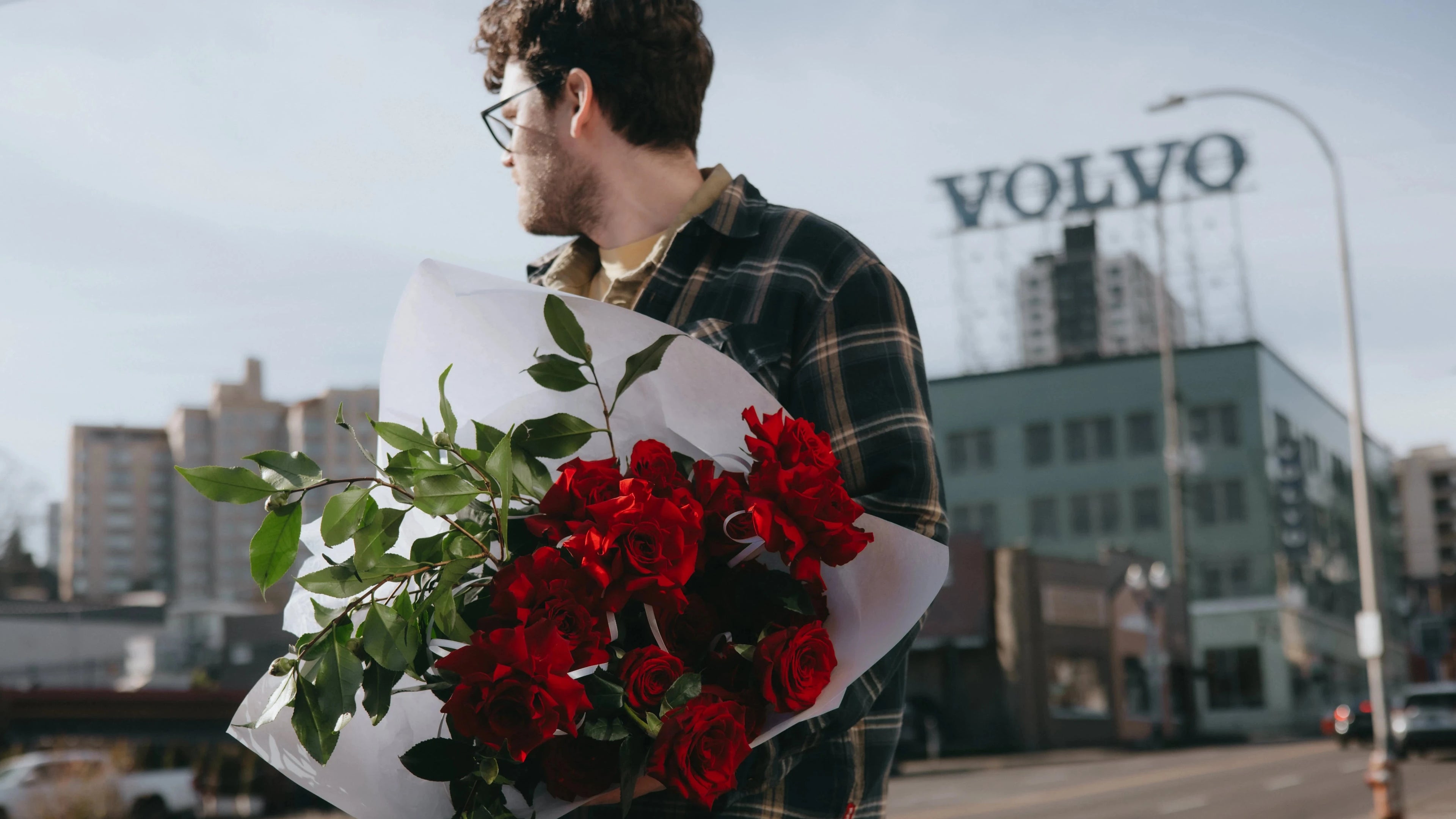 Valentine's Day red roses bouquet with greenery delivered across Austin by Kvetka Flower